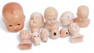 German and English porcelain doll's heads, including BND London, etc. (1 box)