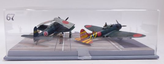 A diorama of Japanese carrier deck scene, for Pearl Harbour Attacks, 1:48 scale, featuring bomber an