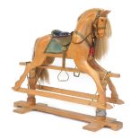 A Stevenson Brothers of England waxed oak rocking horse, No 1011, 1992, with real horse hair mane an