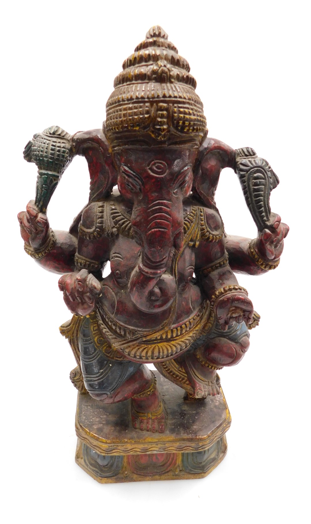 An early 20thC Indian polychrome wooden figure of Gnesh, lord of good fortune, raised on a lotus flo