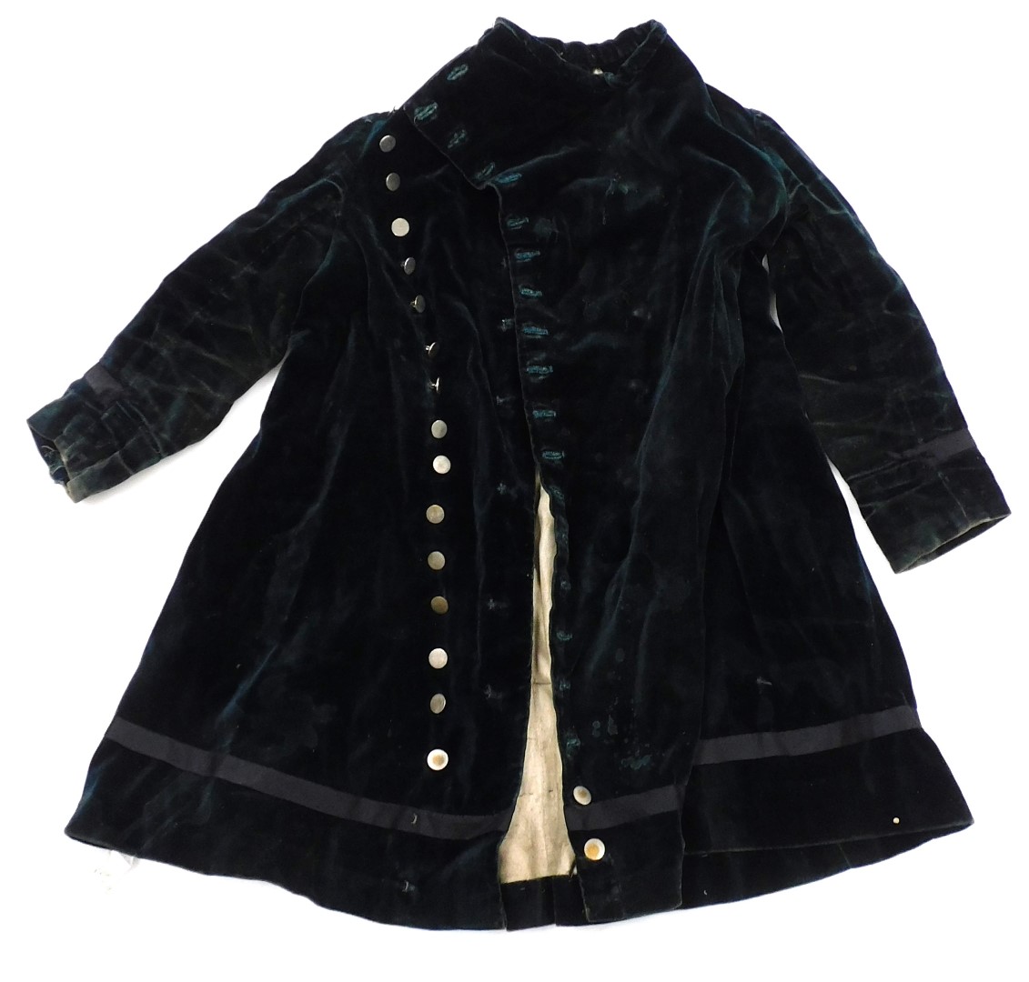 A Victorian child's green velvet jacket.