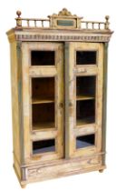 A 19thC continental painted cabinet, the cornice with spindle turned rails and a central tablet, abo