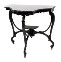 An Edwardian mahogany console table, the shaped top with a moulded edge, on leaf carved cabriole sup