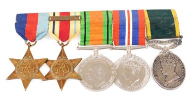 A WWII group of medals, comprising Territorial Efficiency medal, named to GNR A E Webb R.A, 1450220,
