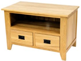 A light oak television cabinet, the rectangular top above a recess and two drawers, on stiles, 93cm