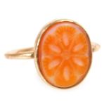 A lady's Sardonyx ring, carved in a floral design, set in yellow metal, size O, 1.7g all in.