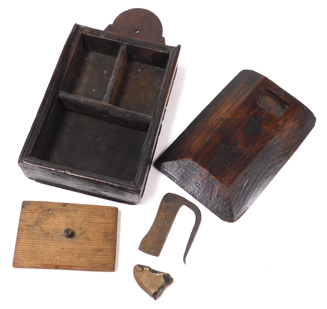 An 18thC oak candle box, with a sliding front opening to reveal three recesses, 30cm high. - Image 2 of 2