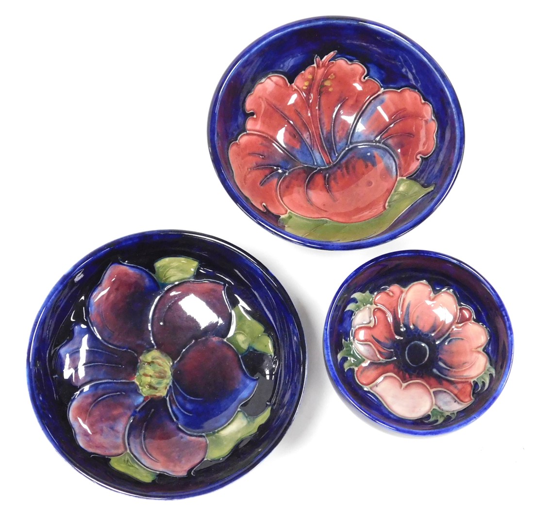 A group of Moorcroft pottery, comprising three bowls decorated in the Hibiscus, Clematis and Anemone - Image 2 of 3