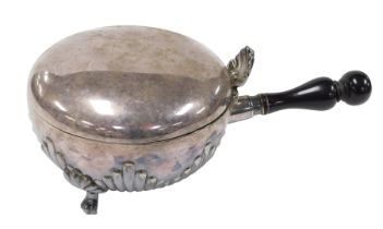 A Victorian silver plated silent butler, with a turned ebony handle, the shell capped hinged lid ope
