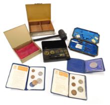 A set of W & J George and Becker Ltd brass gold weights, in a bakelite case, silver plated cigarette