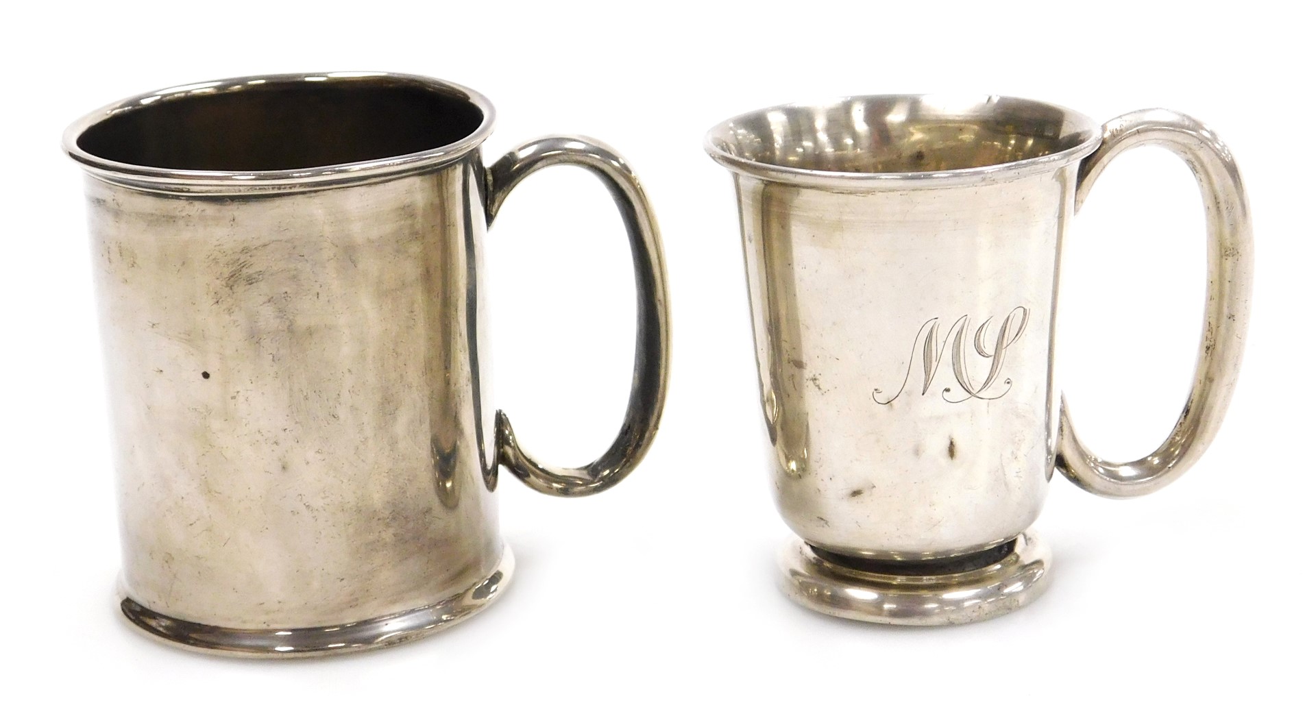 An Edward VII silver christening tankard, Chester 1909 and an Elizabeth II silver christening tankar