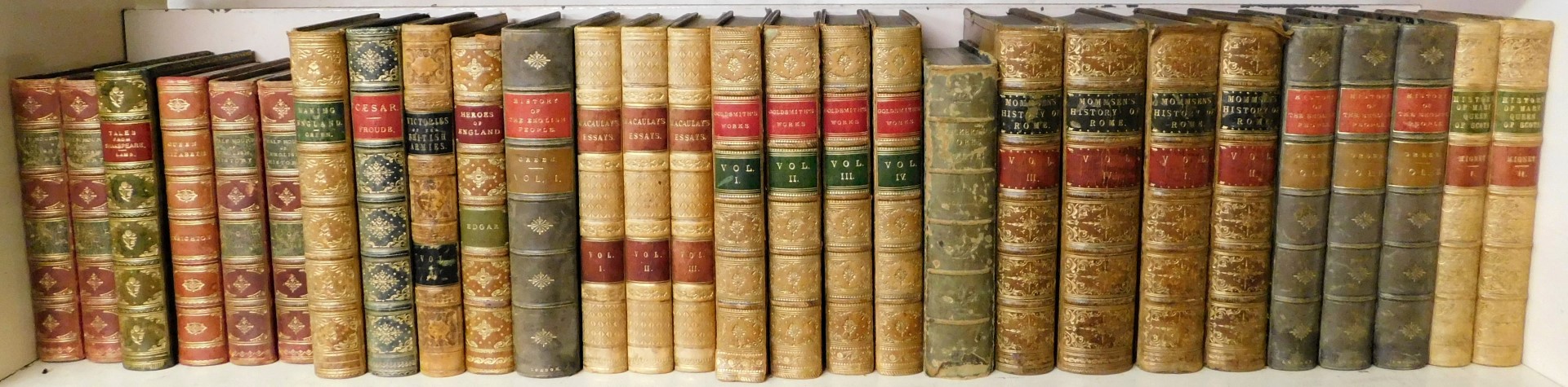 Bindings. Macaulay's Essays three vols, Goldsmith's Works four vols, Mommsen's History of Rome four