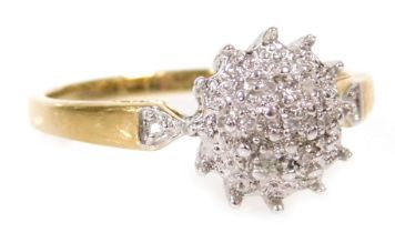 A 9ct gold and diamond flower head cluster ring, in a basket setting, size S, 2.7g all in.