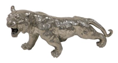 A 20thC plated figure of a Bengal tiger, modelled in standing pose, 48cm wide.