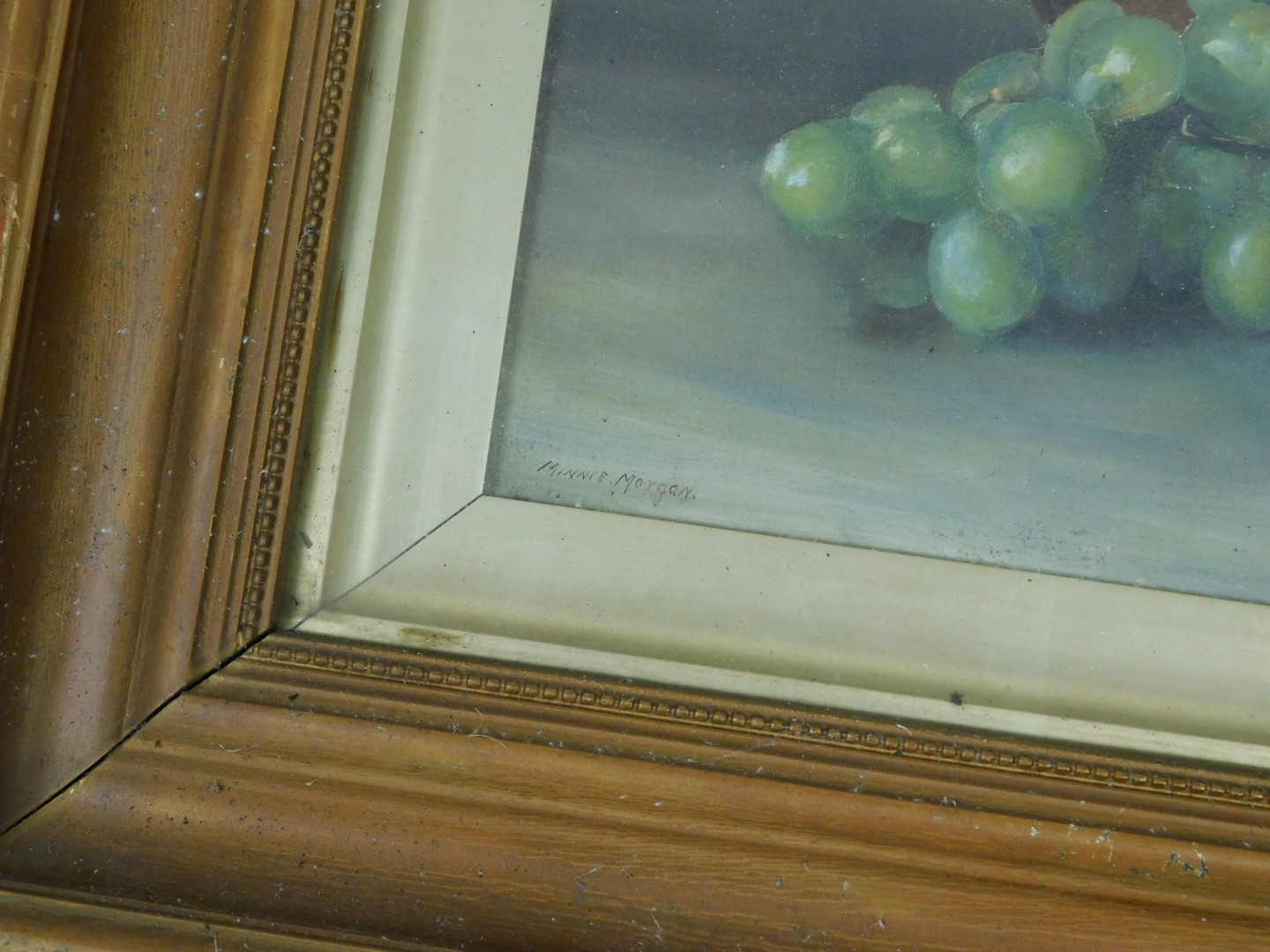 Minnie Morgan (British, early 20thC). Still life of fruit, with a wine glass and bottle, oil on canv - Image 3 of 3