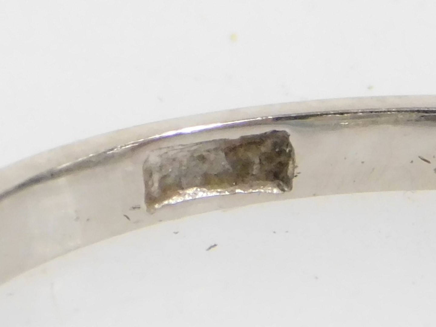 An early 20thC oval diamond and platinum solitaire ring, high claw set, approximately 0.9ct, size N, - Image 2 of 2