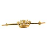 A naval crown bar brooch, stamped 14ct, in a box for the Goldsmiths and Silversmiths Company Ltd, 11