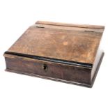 A Victorian oak table top clerk's desk, the hinged lid opening to reveal a vacant interior, with thr