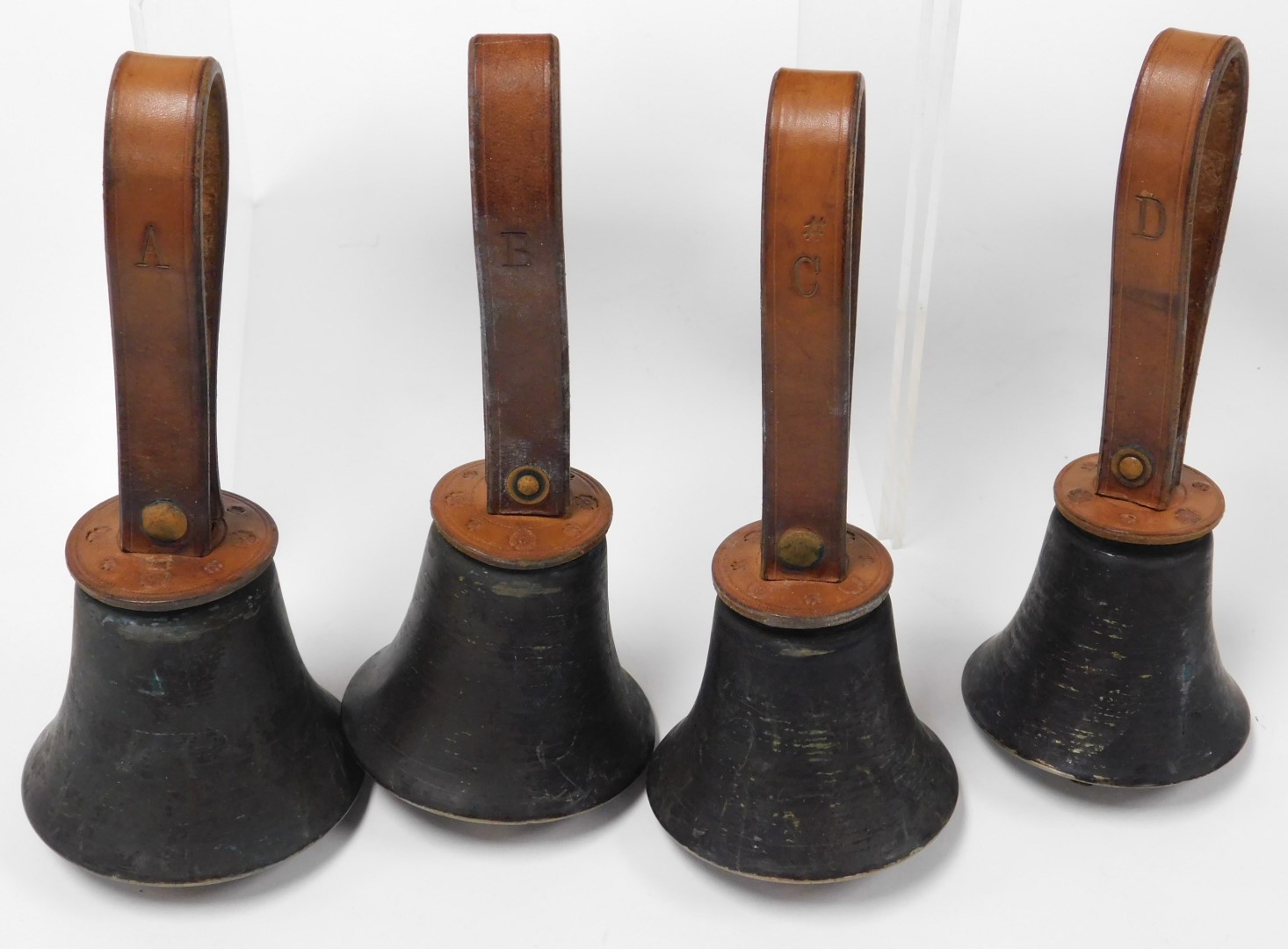Twelve vintage graduated brass hand bells, with tan leather straps, denoting the note, cased. - Image 4 of 5