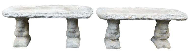 A pair of concrete garden benches, with rustic seats, raised on squirrel supports, 99cm wide.