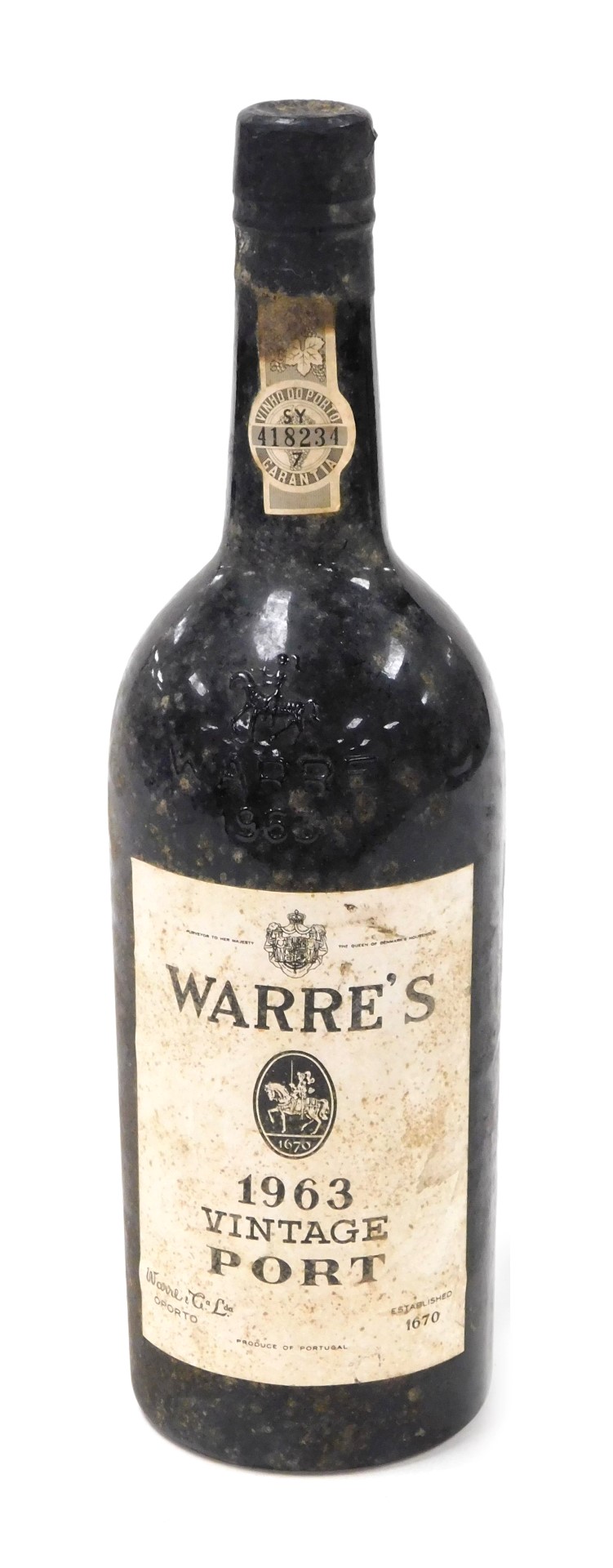 A bottle of Warre's 1963 vintage port, serial number SY418234.