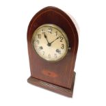 An Edwardian mahogany and inlaid mantel clock, circular cream dial bearing Arabic numerals, Kienzle