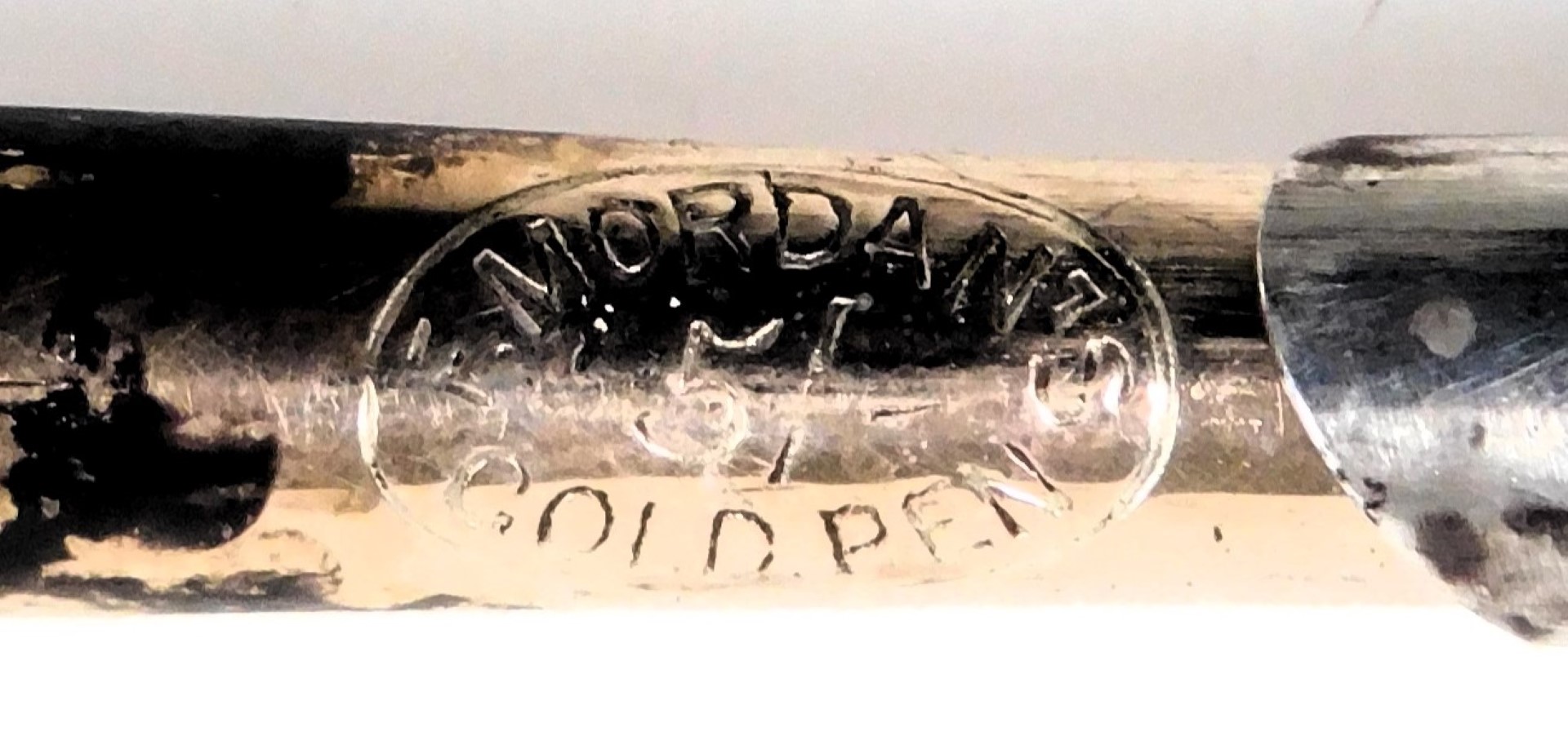 A Samson Mordan and Company propelling pen and pencil, white metal, with foliate engraving, together - Image 2 of 4