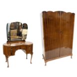 A mahogany two part bedroom suite, comprising wardrobe with shaped doors and cabriole legs 117cm wid