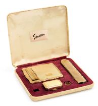 A mid century Stratton lady's compact and lipstick, together with a folding comb and a pill box, cas