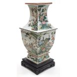 A 20thC Chinese porcelain famille verte vase, of square, baluster form, decorated with exotic birds,