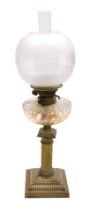 An early 20thC Messenger's number one brass oil lamp, of column form, with a fluted pressed glass re