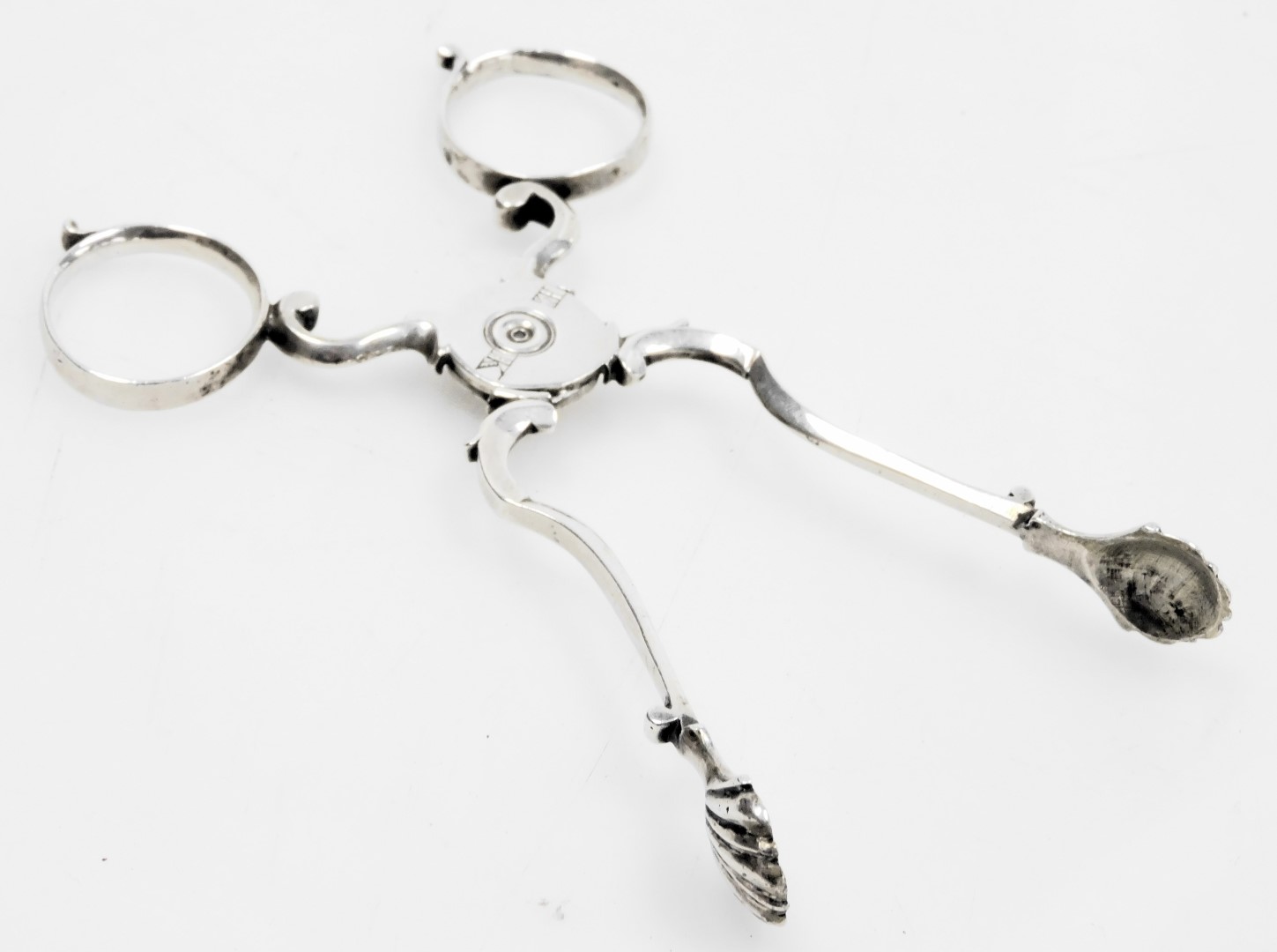 A pair of Georgian silver scissor action sugar tongs, with shell shaped bowls, engraved EK, makers m - Image 2 of 3