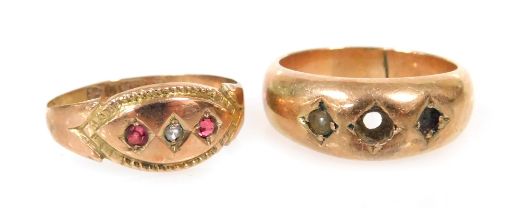 A Victorian 9ct gold and paste set three stone dress ring, size M, 0.9g, and a gypsy ring, stones la
