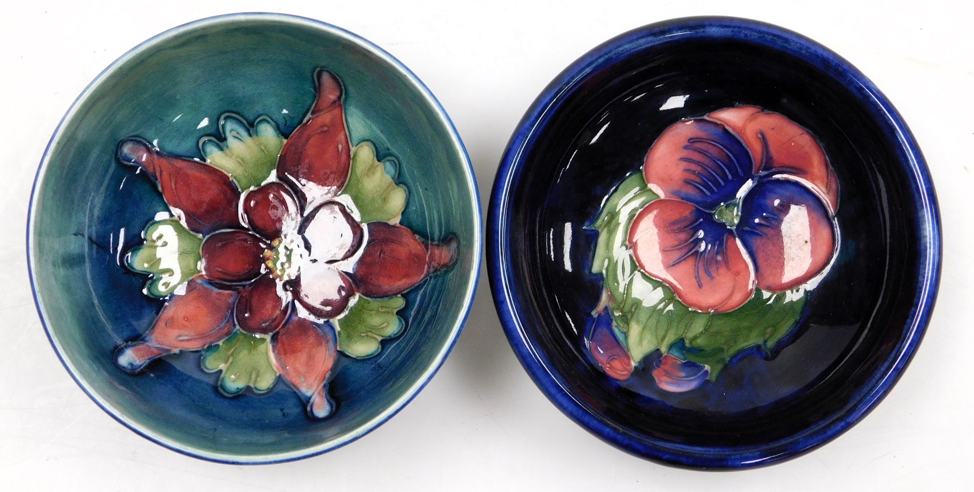 A Moorcroft pottery Columbine pattern bowl, light blue ground, impressed marks, together with a Pans - Image 2 of 3