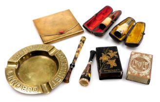 Assorted smoking memorabilia, including a Dubonet advertising brass ashtray, Bryant and May's metal