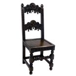 A 19thC oak Derbyshire chair, with floral and foliate carved crest rail and back, solid seat, raised