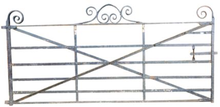 A large cast iron garden gate, 277cm wide, 130cm high.