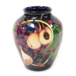 A Moorcroft pottery Queen's Choice pattern vase, of shouldered tapering form, decorated Kerri, 2000,