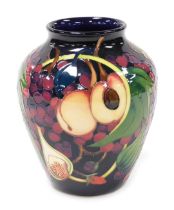 A Moorcroft pottery Queen's Choice pattern vase, of shouldered tapering form, decorated Kerri, 2000,