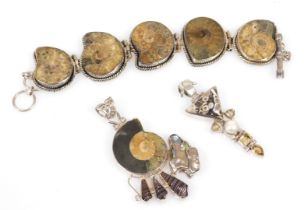 A silver and ammonite set five link bracelet, on a ring and bar clasp, an ammonite, blister pearl an