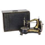 A late 19thC Jones & Company sewing machine, of Guide Bridge, Manchester, pine box.