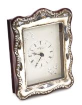 A silver mounted wooden strut clock by R Carr, rectangular dial with chapter ring bearing Roman nume
