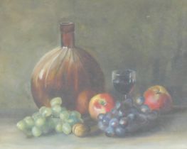 Minnie Morgan (British, early 20thC). Still life of fruit, with a wine glass and bottle, oil on canv