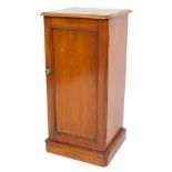 A Victorian mahogany pot cupboard, the rectangular top with a moulded edge, above a single panelled