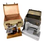 A early 20thC Essex miniature sewing machine, cased, together with an unnamed child's sewing machine