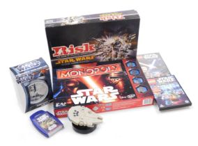 A group of Star Wars toys and collectables, comprising Monopoly and Risk, battery operated Millenium