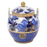 A late 19thC Wedgwood pottery twin handled pot pourri vase and cover, decorated in blue and white wi