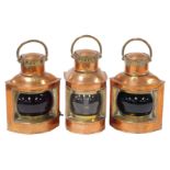Three copper and brass ship's lights, converted to electricity, comprising port, starboard and stern