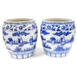 A pair of Chinese blue and white jardineres, each decorated with figures within leaf and flower bord