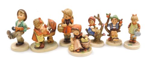 Eight Hummel pottery figures, comprising Doll Mother, School Girl, Happy Traveller, Little Gardener,